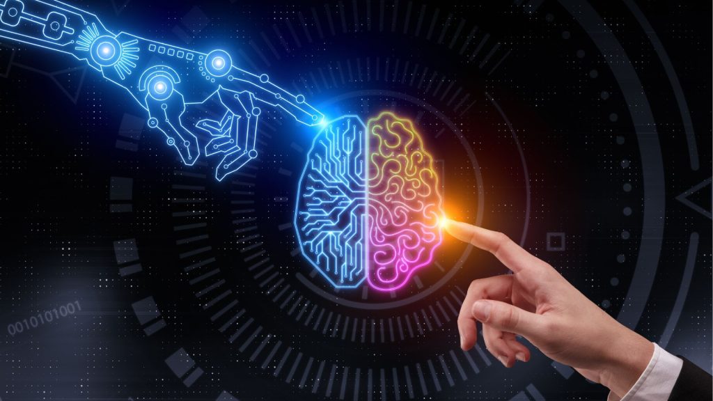 Deux mains, une robotique et une humaine qui se rejoignent vers un cerveau digital